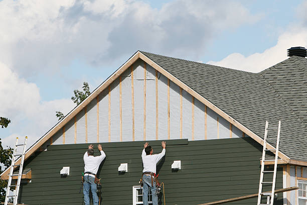 Professional Storm Damage Siding Repair technician working in Lockport, IL